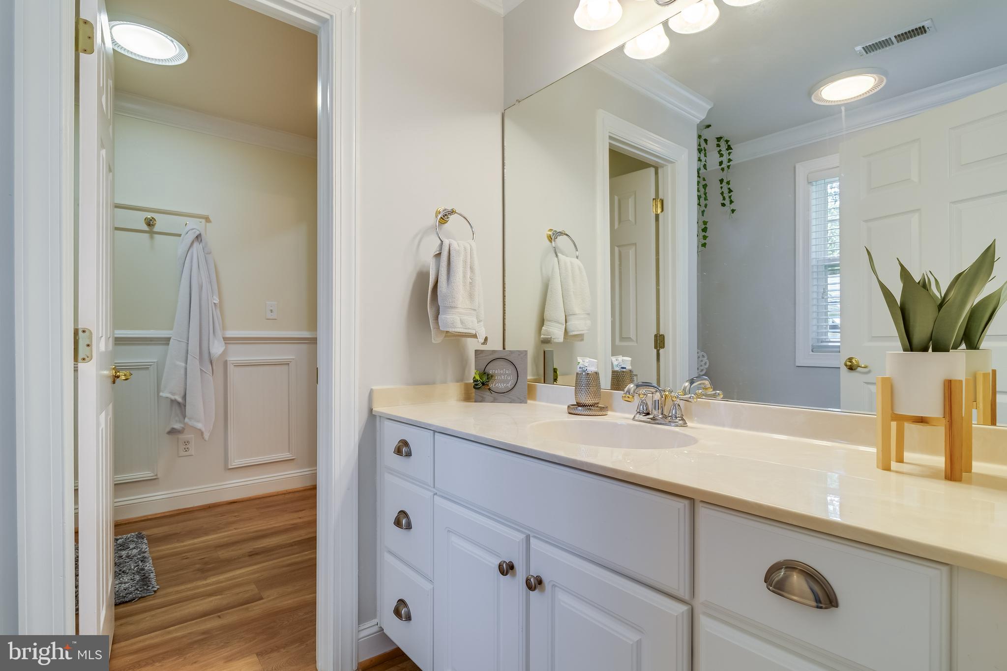 11375 Ethan Court Swan Point, MD 20645 - Photo 39 of 55 a bathroom with a sink and a mirror