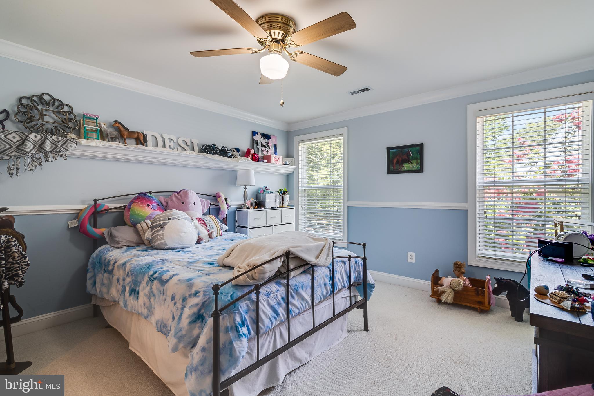11375 Ethan Court Swan Point, MD 20645 - Photo 43 of 55 a bedroom with a bed and a chandelier