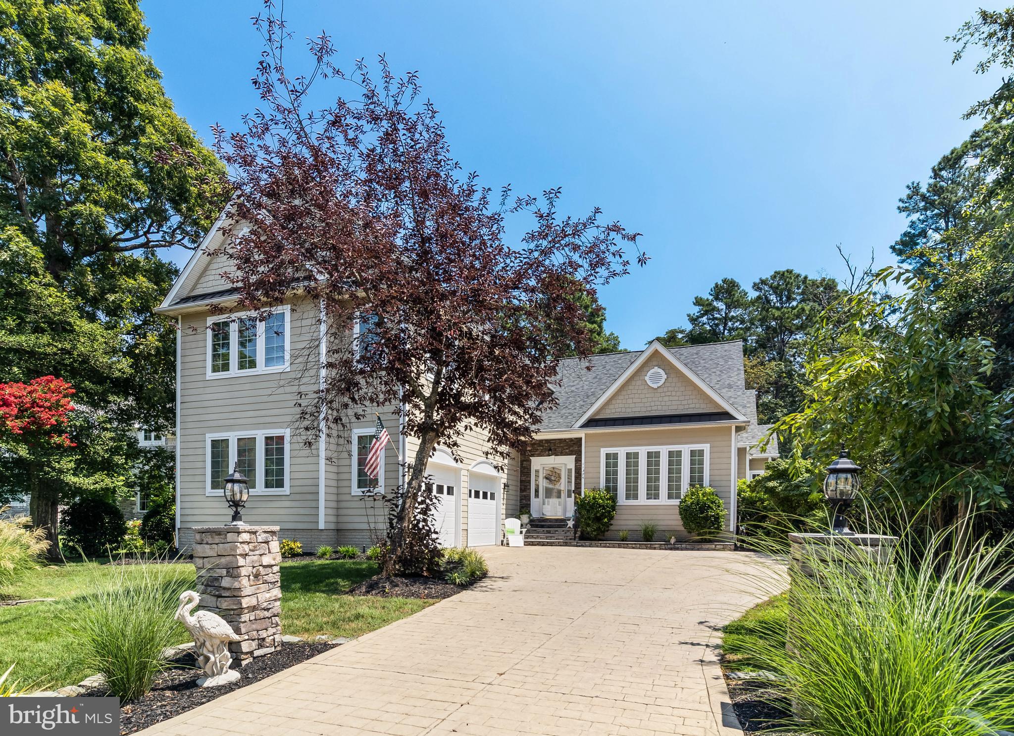 11375 Ethan Court Swan Point, MD 20645 - Photo 55 of 55 a front view of a house with a garden
