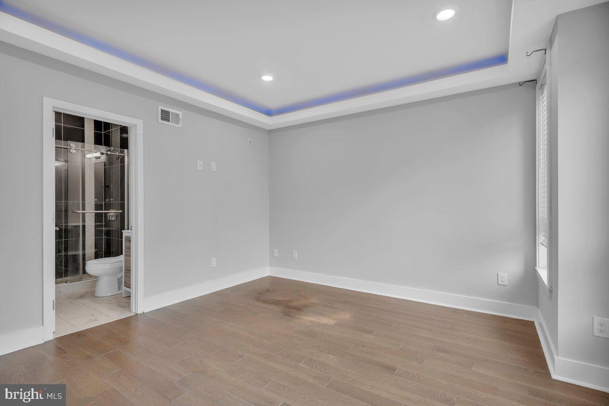 2562 Frankford Avenue, Unit 2 Philadelphia, PA 19125 - Photo 21 of 23 wooden floor in an empty room