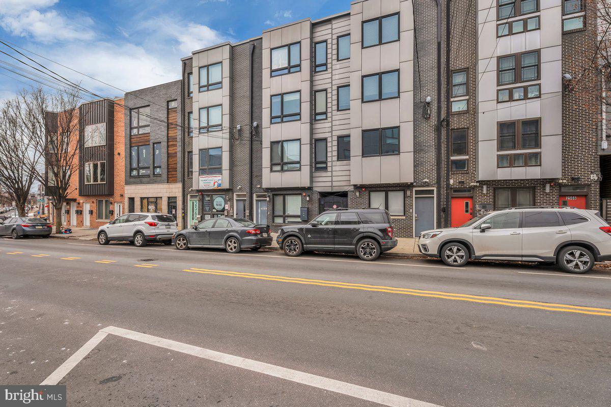 2562 Frankford Avenue, Unit 2 Philadelphia, PA 19125 - Photo 4 of 23 a cars parked in front of a building