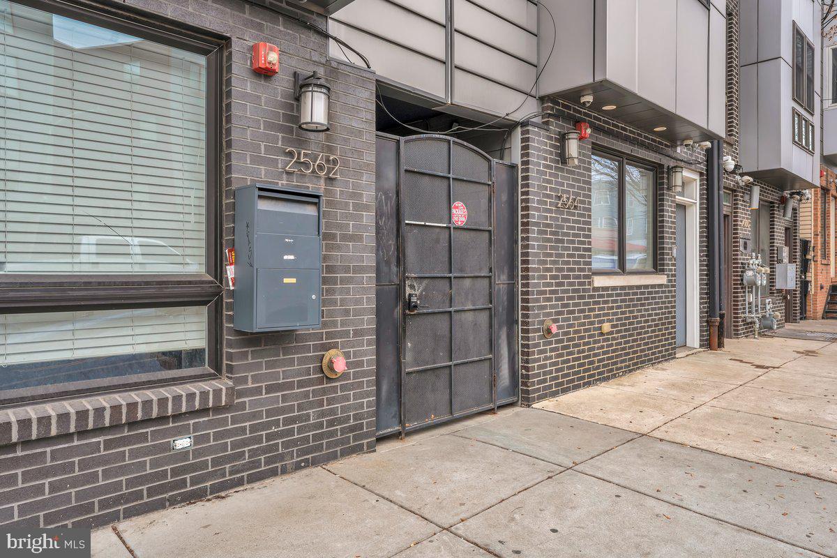 2562 Frankford Avenue, Unit 2 Philadelphia, PA 19125 - Photo 6 of 23 a yellow house with a outdoor space