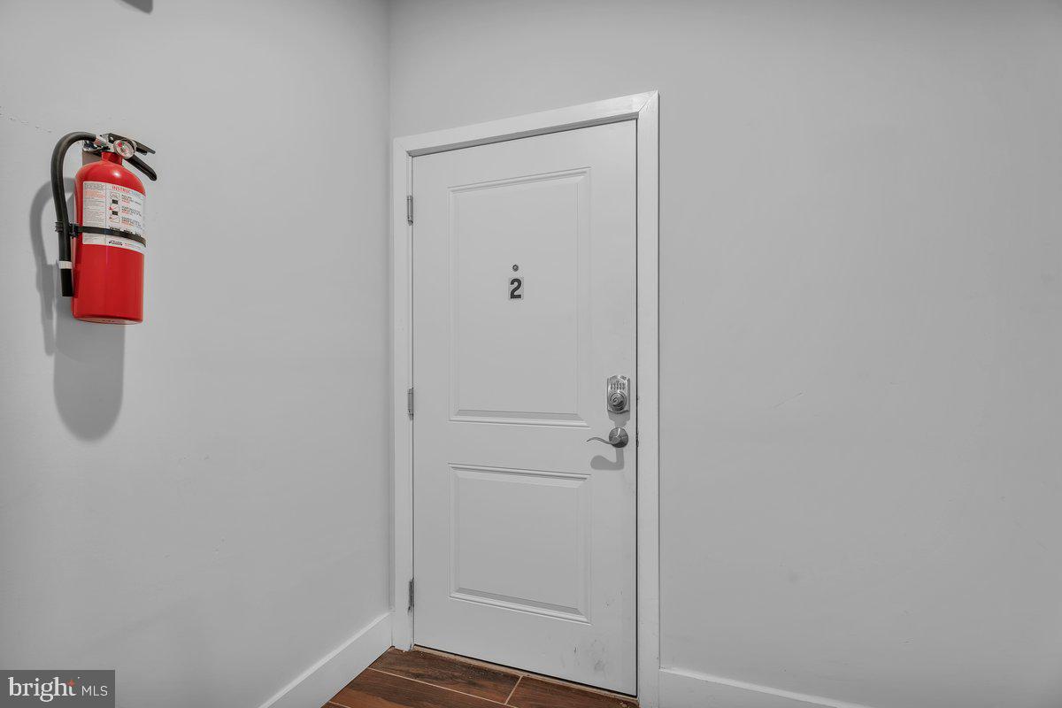 2562 Frankford Avenue, Unit 2 Philadelphia, PA 19125 - Photo 7 of 23 a room with a door and a shower