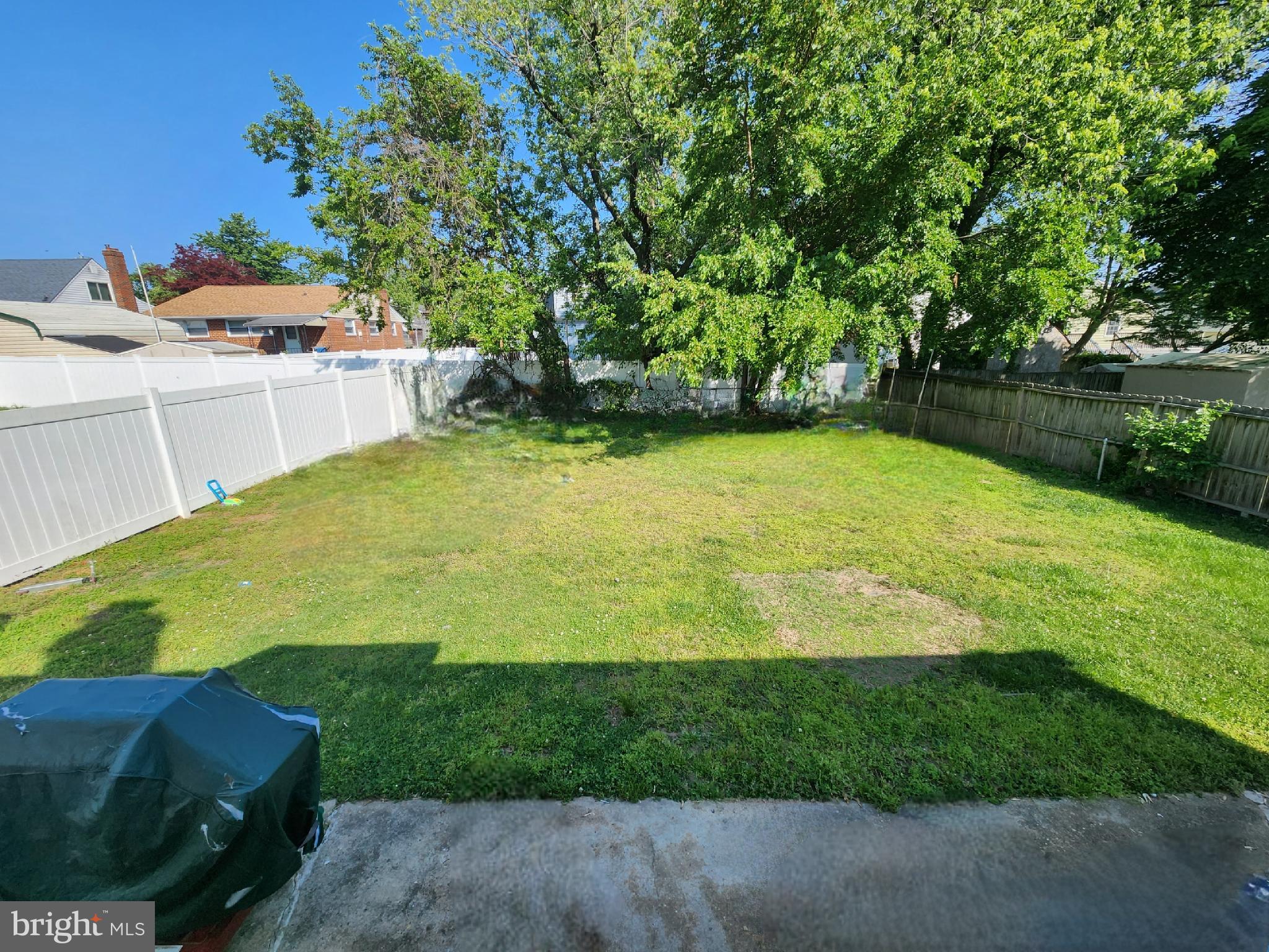250 Carroll Road Pasadena, MD 21122 - Photo 16 of 16 fenced in level back yard
