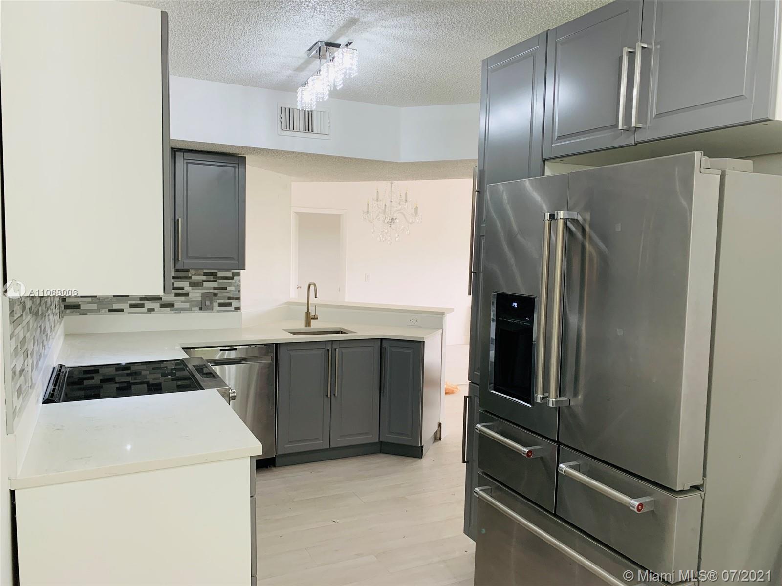 8801 Wiles Road Coral Springs, FL 33067 - Photo 4 of 34