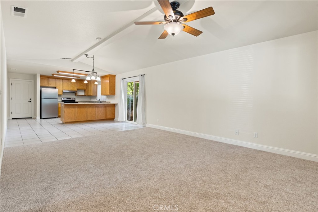 38 Kobe Loop Chico, CA 95973 - Photo 6 of 38 a view of empty room with a ceiling fan and window