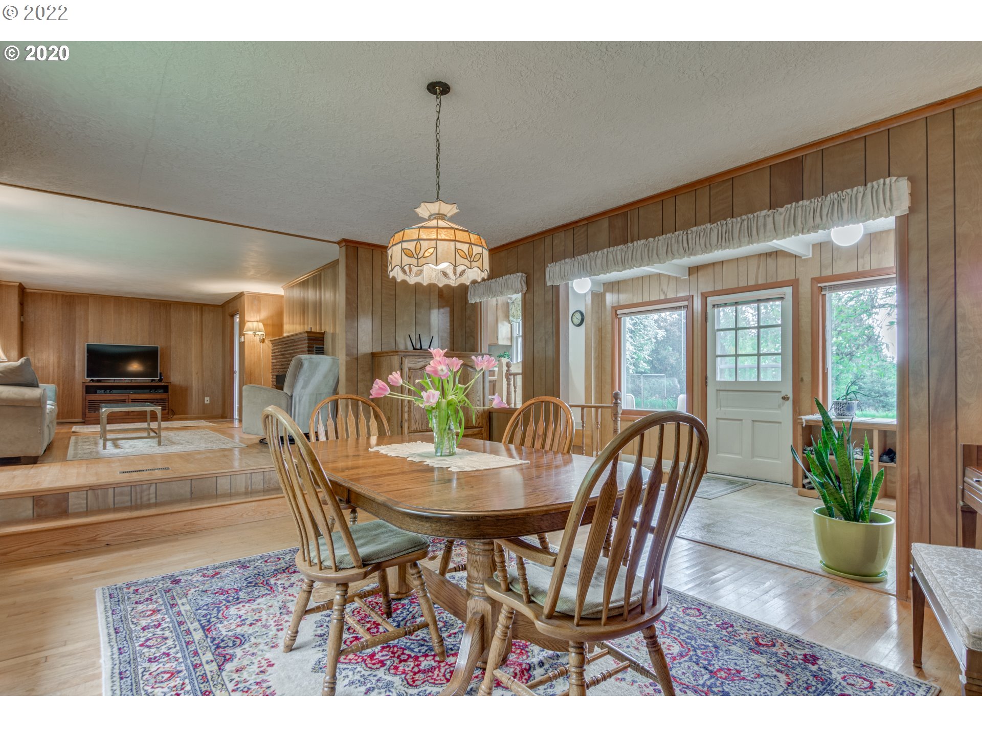 1650 North Royle Road Ridgefield, WA 98642 - Photo 22 of 24 a view of a dining room with furniture and chandelier