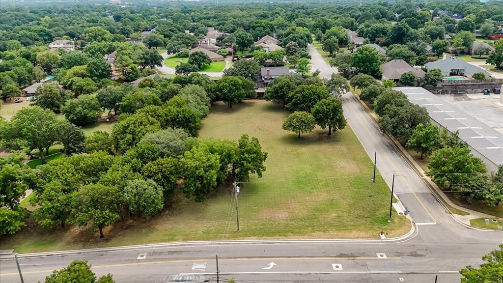 105 Cheek-Sparger Road Colleyville, TX 76034 - Photo 3 of 7 an aerial view of residential houses with outdoor space and trees