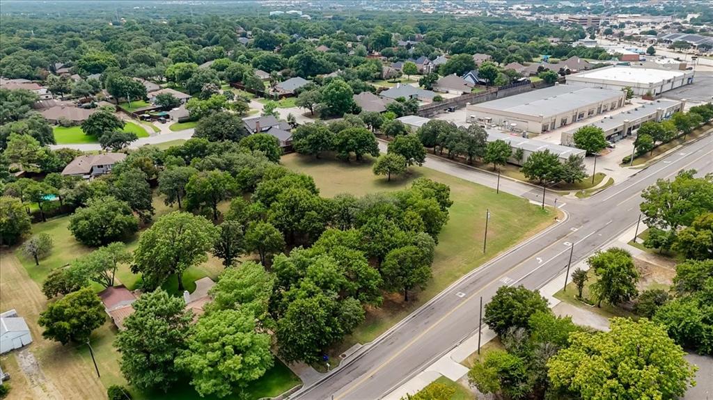 105 Cheek-Sparger Road Colleyville, TX 76034 - Photo 4 of 7 an aerial view of a house with a yard and lake view