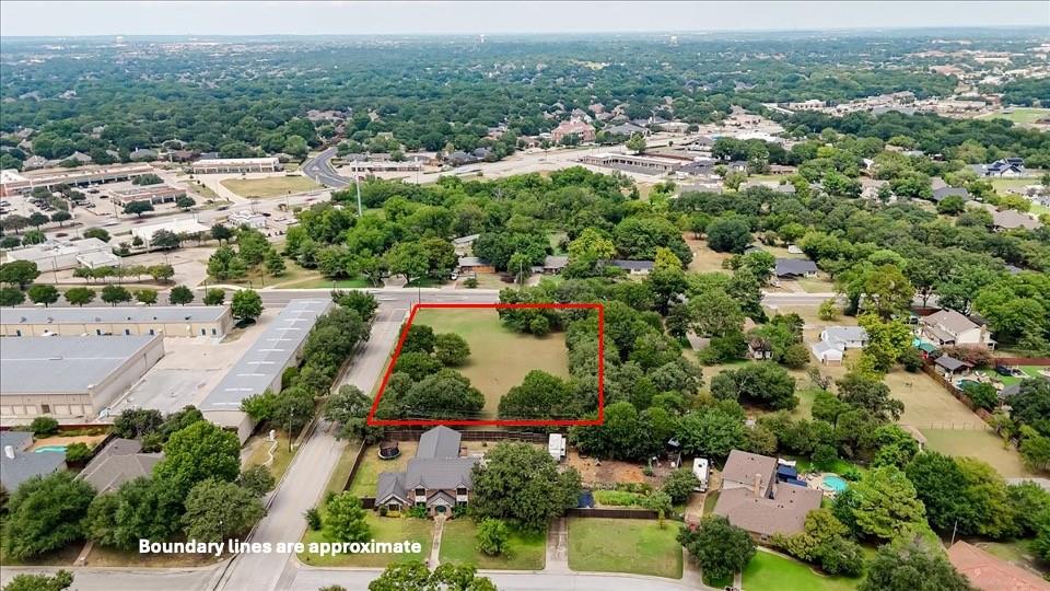 105 Cheek-Sparger Road Colleyville, TX 76034 - Photo 6 of 7 an aerial view of residential houses with outdoor space