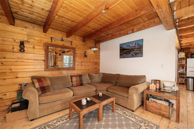 a view of a balcony with wooden floor