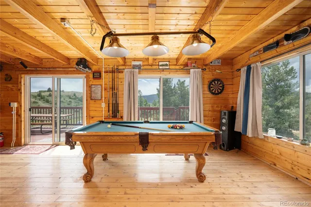 a view of a living room with a rug
