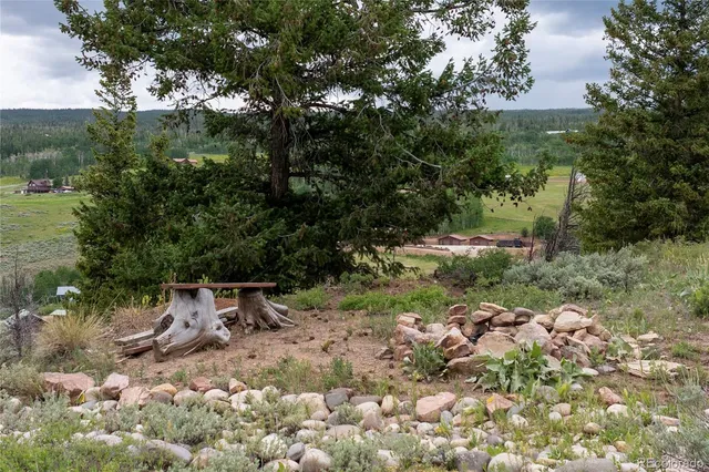a view of a lake with a big yard