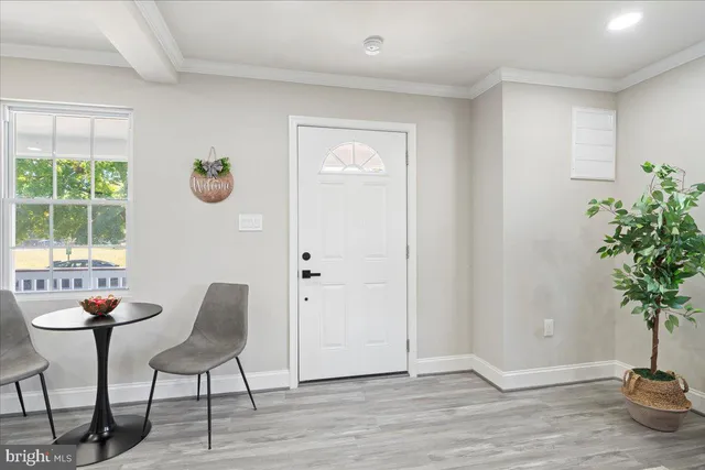 a view of a livingroom with furniture and window