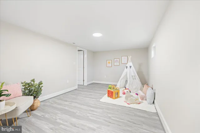 a living room with wooden floor