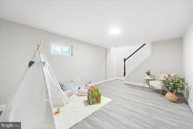 a room with a bed and a window