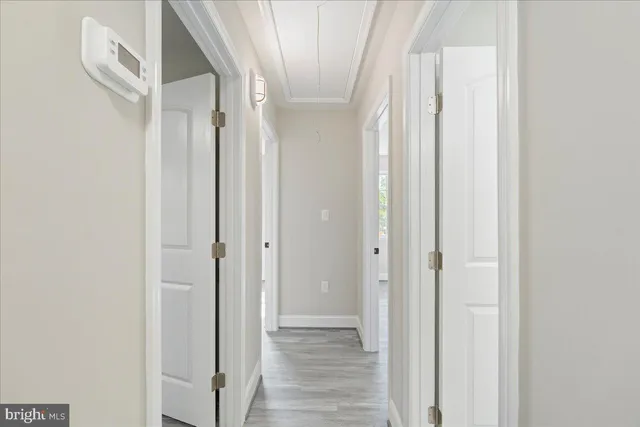 a bedroom with a bed and a cabinet