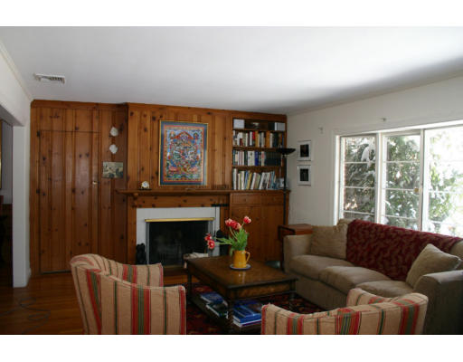 19 Jeffrey Road Wayland, MA 01778 - Photo 3 of 15 a living room with furniture a fireplace and a large window