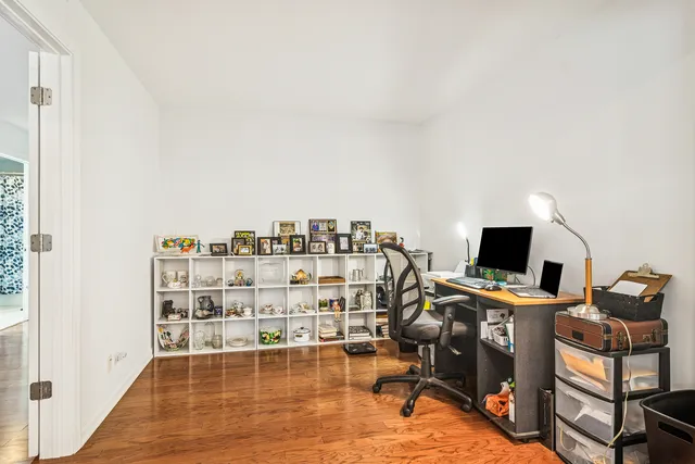 a view of a workspace with furniture
