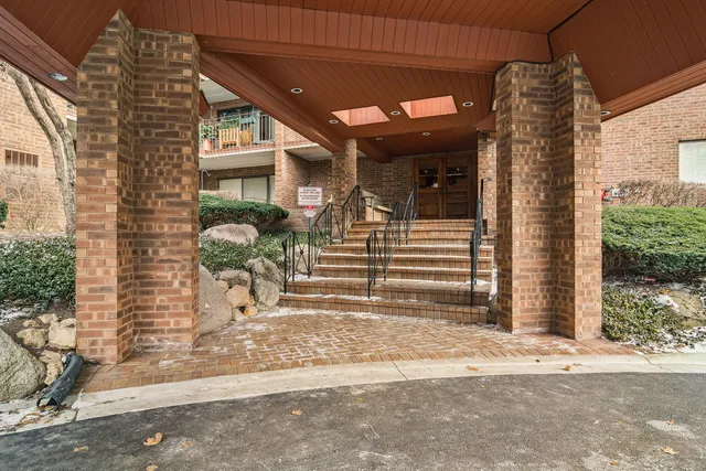 a view of a building with a street