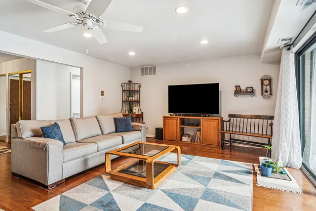 a living room with furniture and a couch