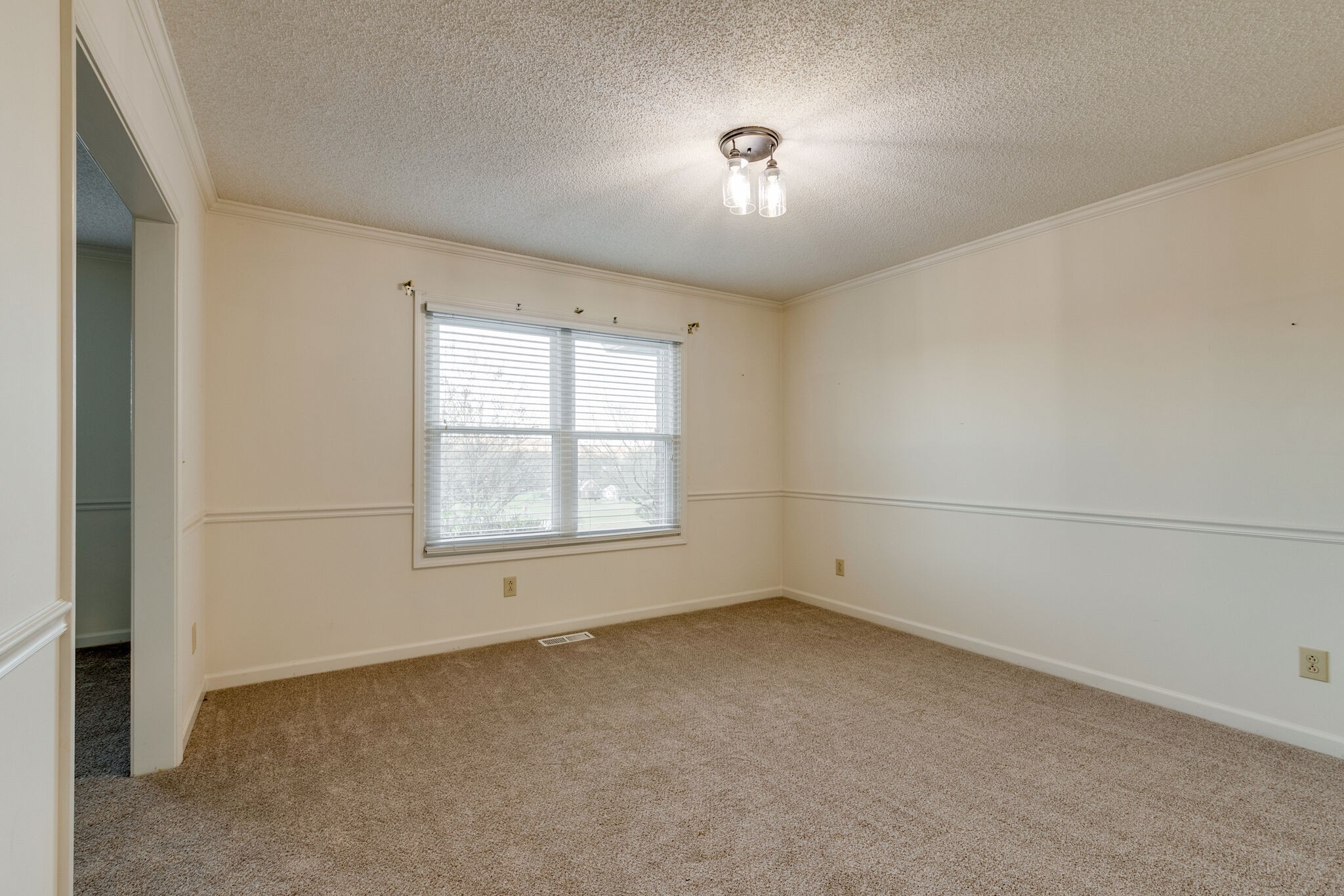 421 Ranch Road Portland, TN 37148 - Photo 16 of 38 an empty room with a empty space and windows