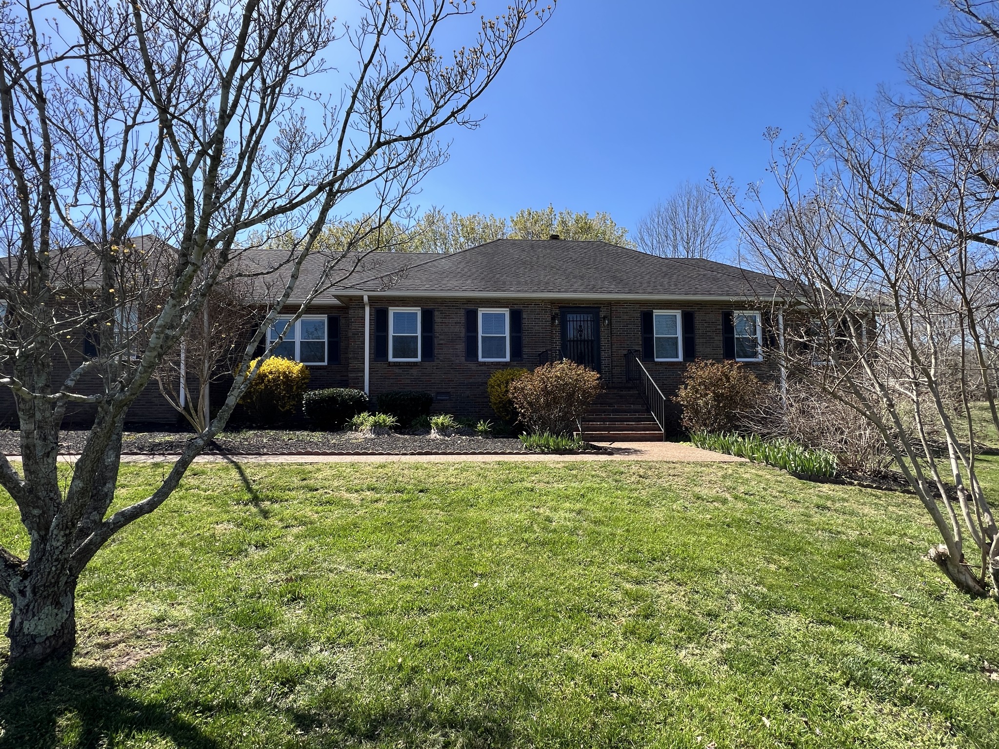 421 Ranch Road Portland, TN 37148 - Photo 36 of 38 a front view of house with yard and green space