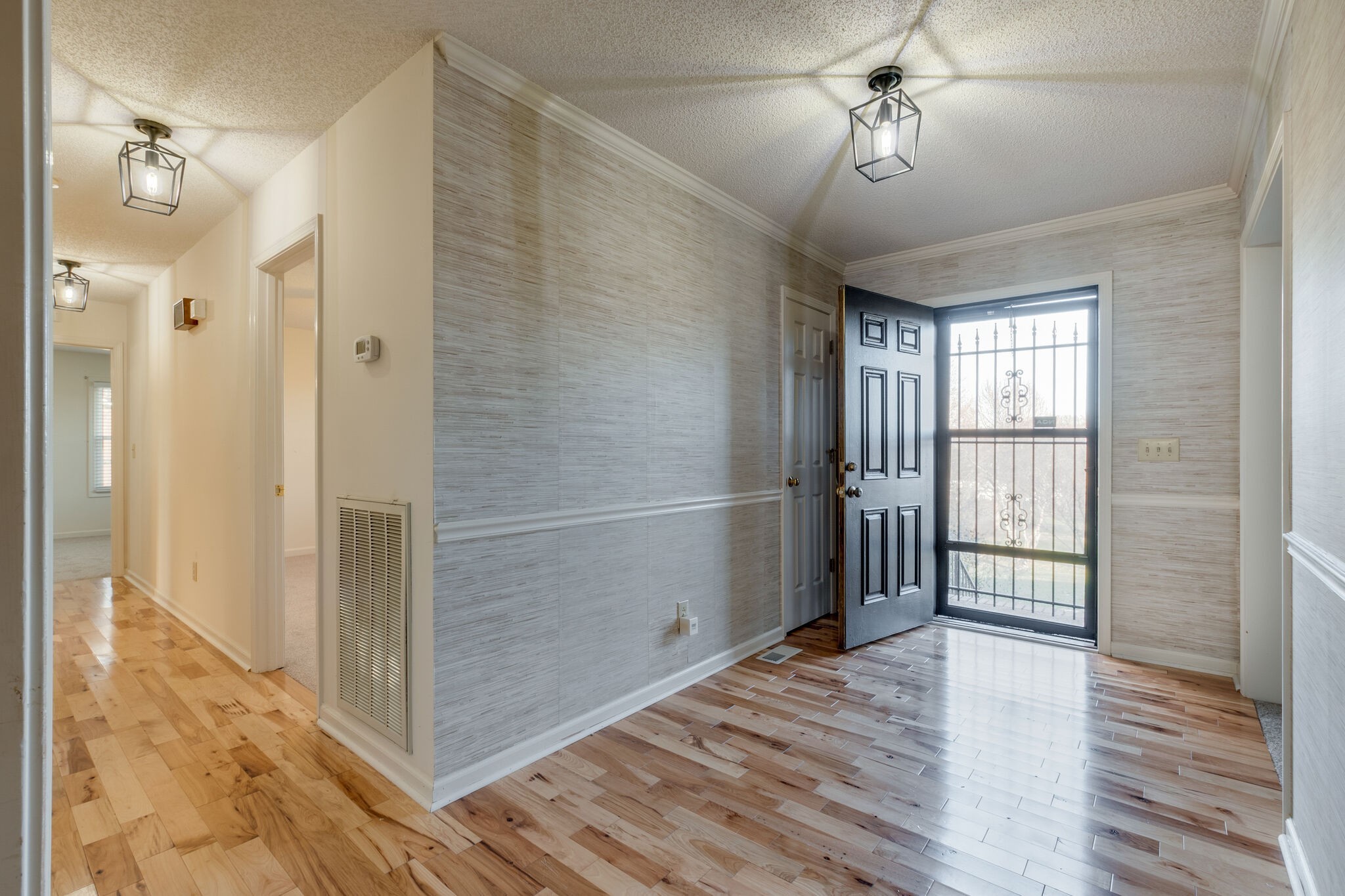 421 Ranch Road Portland, TN 37148 - Photo 5 of 38 a view of empty room with wooden floor and fan