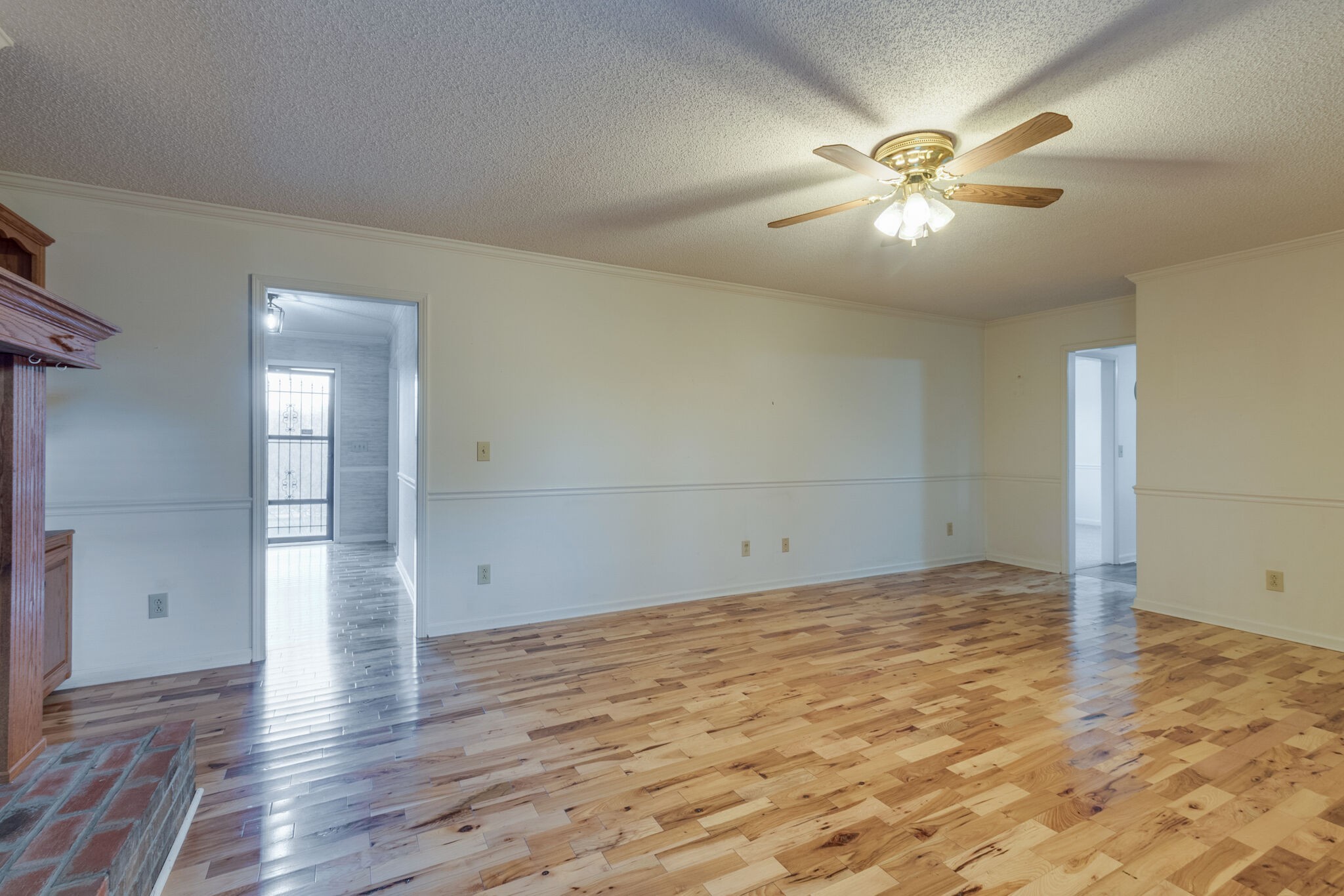 421 Ranch Road Portland, TN 37148 - Photo 10 of 38 an empty room with wooden floor and closet area