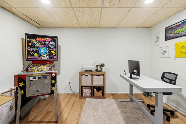 a view of a workspace with furniture