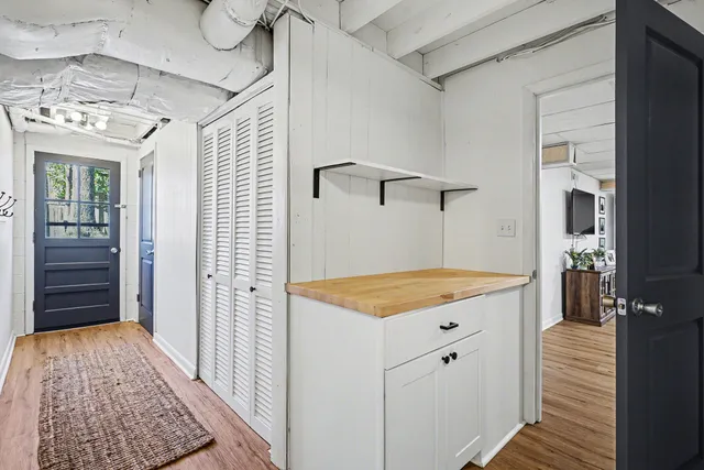 a very nice looking room with wooden floor