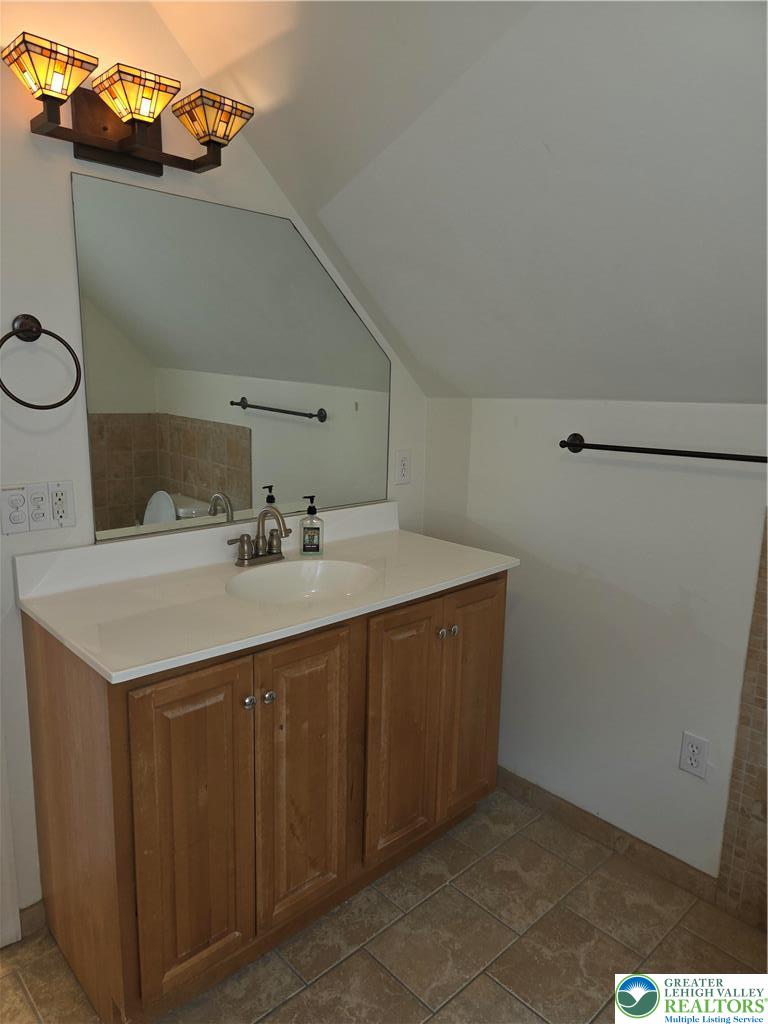 12 West 4th Street, Unit 4 Bethlehem, PA 18015 - Photo 21 of 29 a bathroom with a sink vanity and toilet