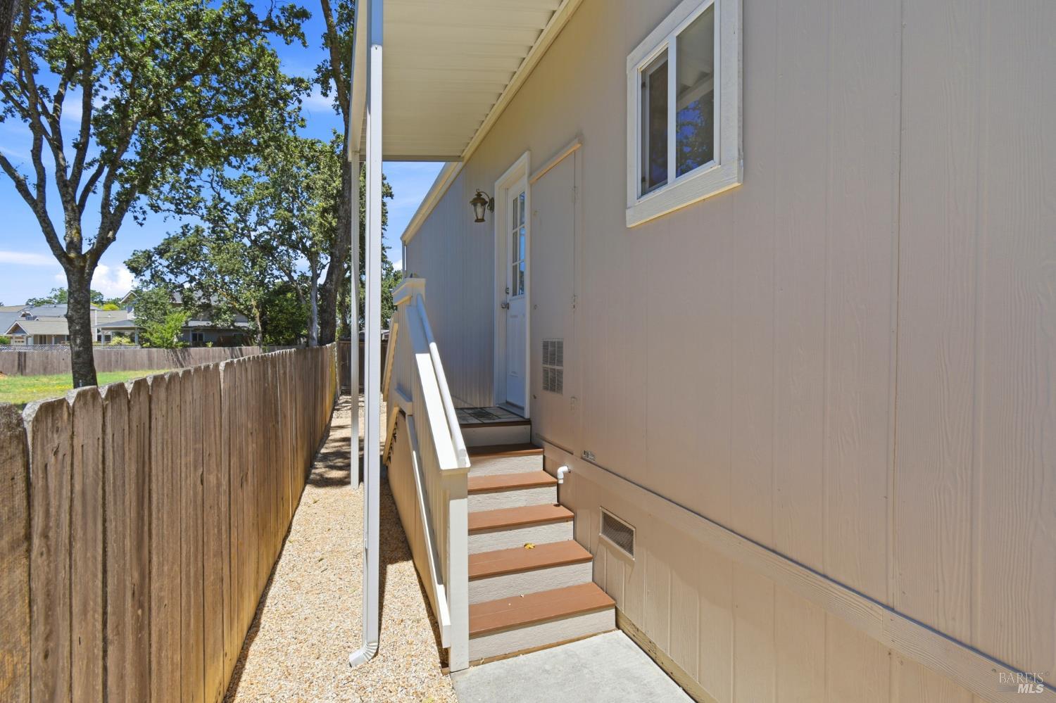 120 Shamrock Circle Santa Rosa, CA 95403 - Photo 36 of 45 a view of staircase with wooden floor and fence