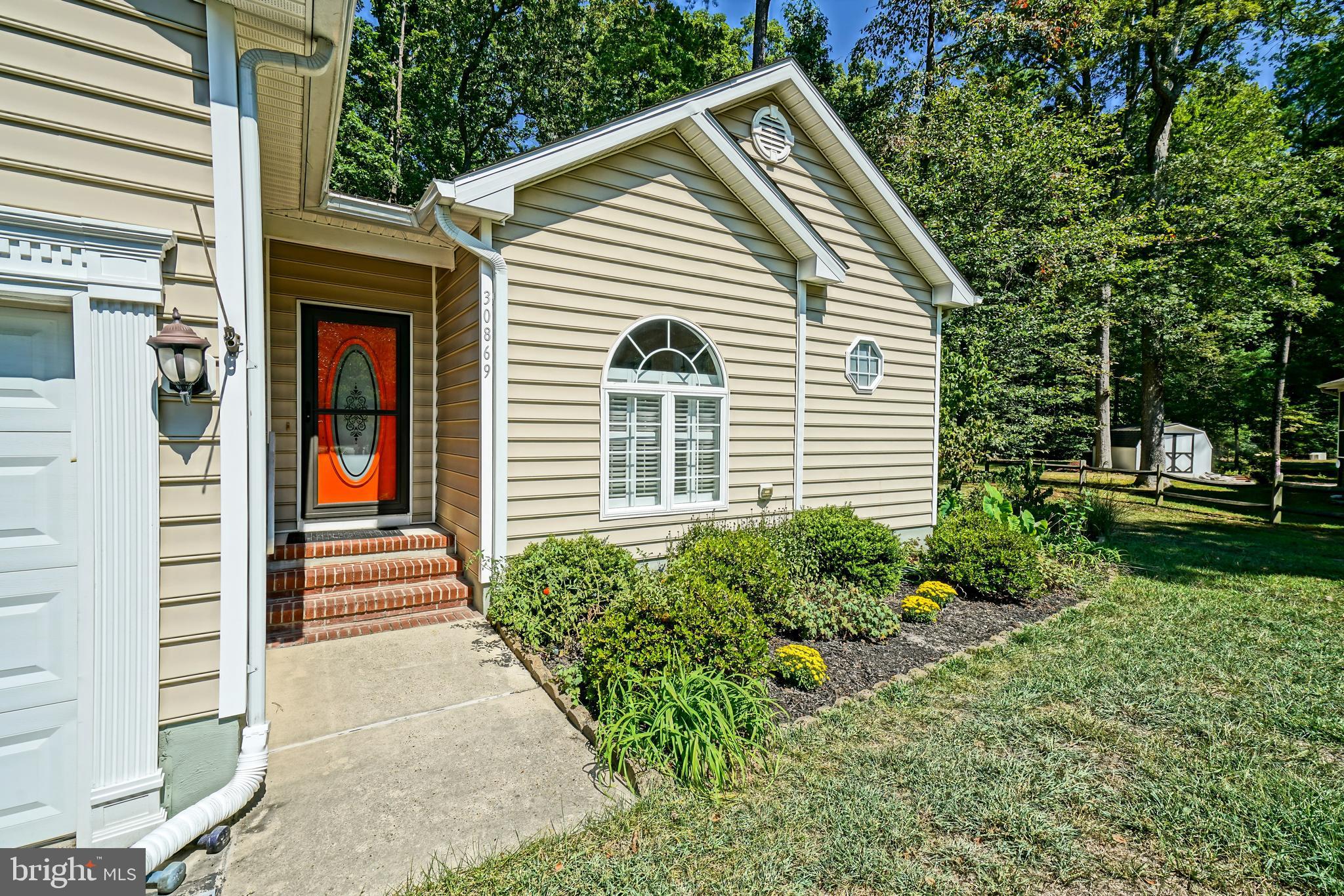 30869 Ridge Court Lewes, DE 19958 - Photo 3 of 42 a view of a house with a yard