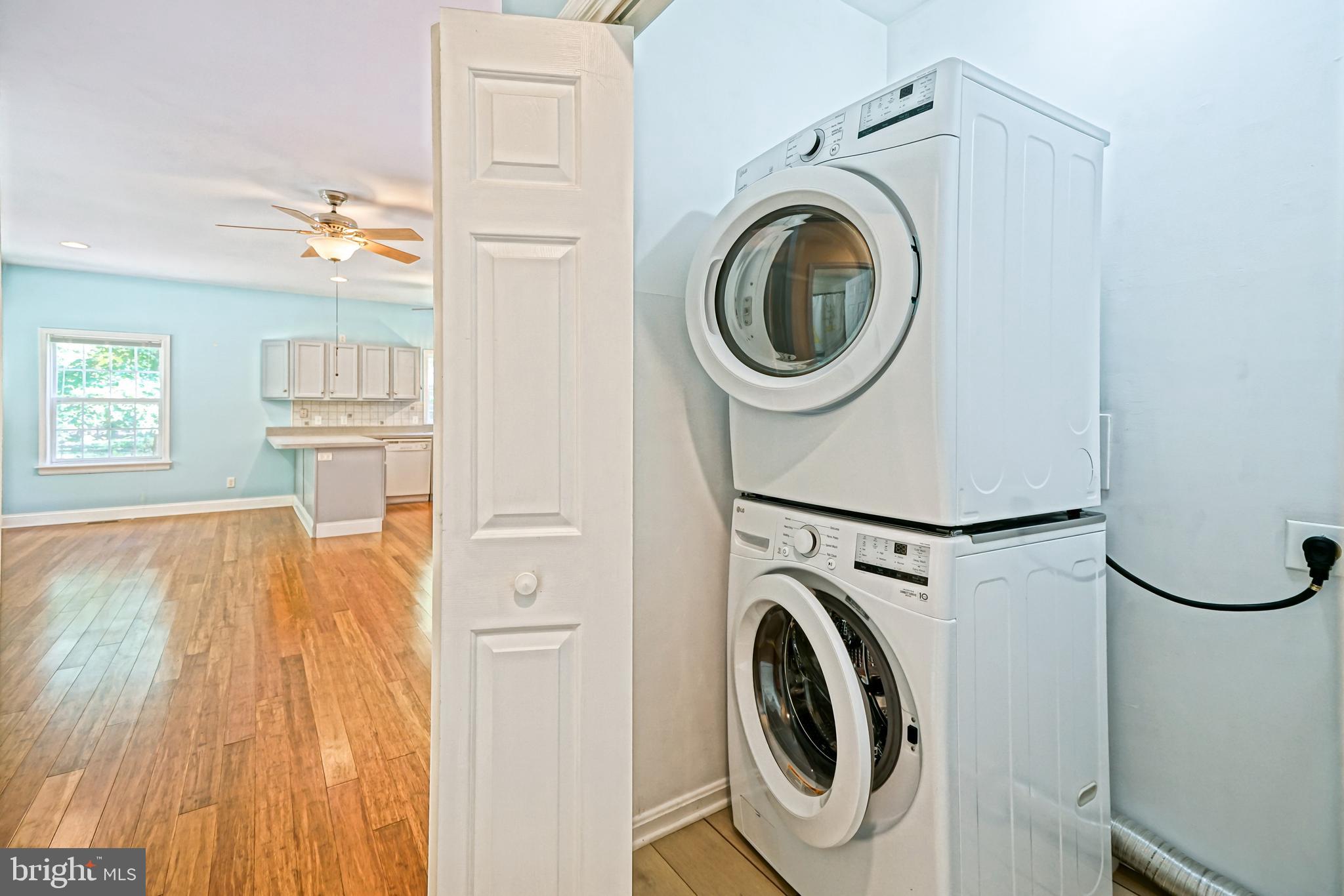 30869 Ridge Court Lewes, DE 19958 - Photo 33 of 42 a view of a storage & utility room with washer and dryer