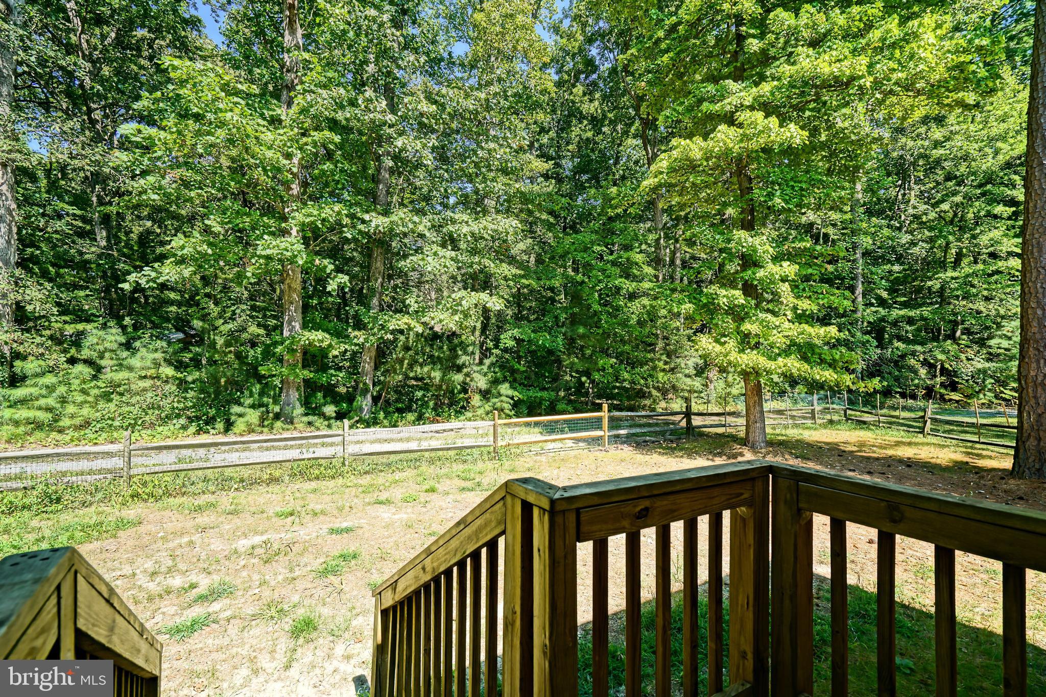 30869 Ridge Court Lewes, DE 19958 - Photo 34 of 42 a view of a outdoor space with seating area