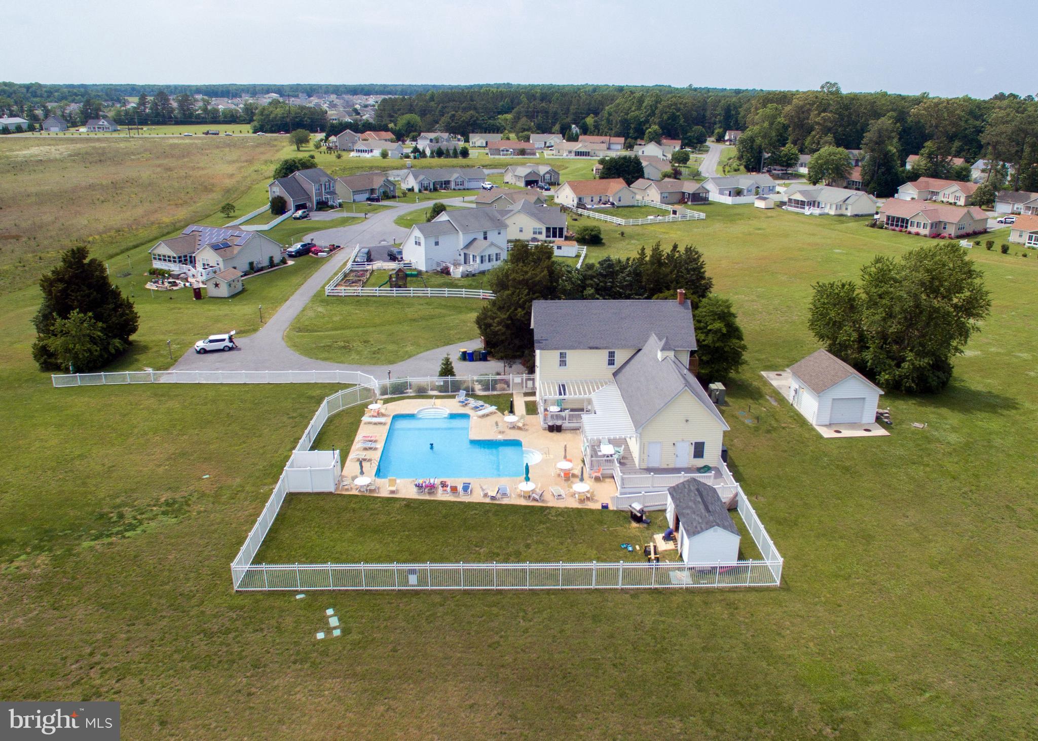 30869 Ridge Court Lewes, DE 19958 - Photo 42 of 42 a view of a swimming pool with a lake view