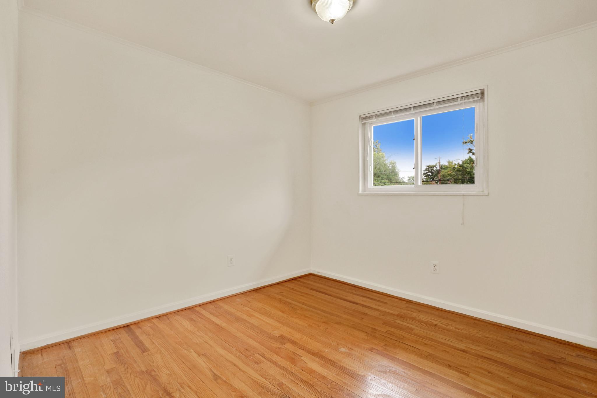 2911 Farm Road Alexandria, VA 22302 - Photo 16 of 35 a view of empty room with wooden floor