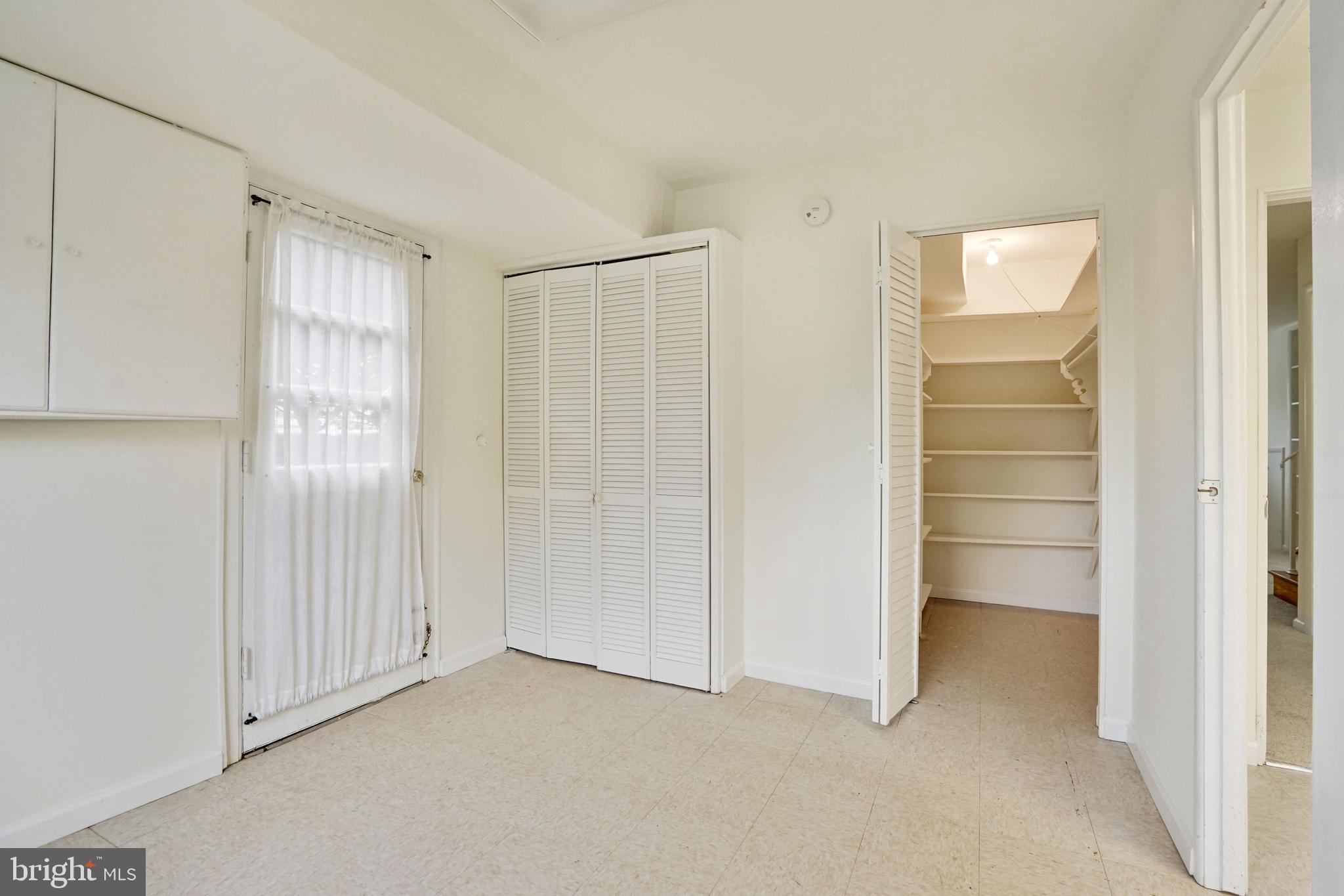 2911 Farm Road Alexandria, VA 22302 - Photo 27 of 35 a view of an empty room with a window