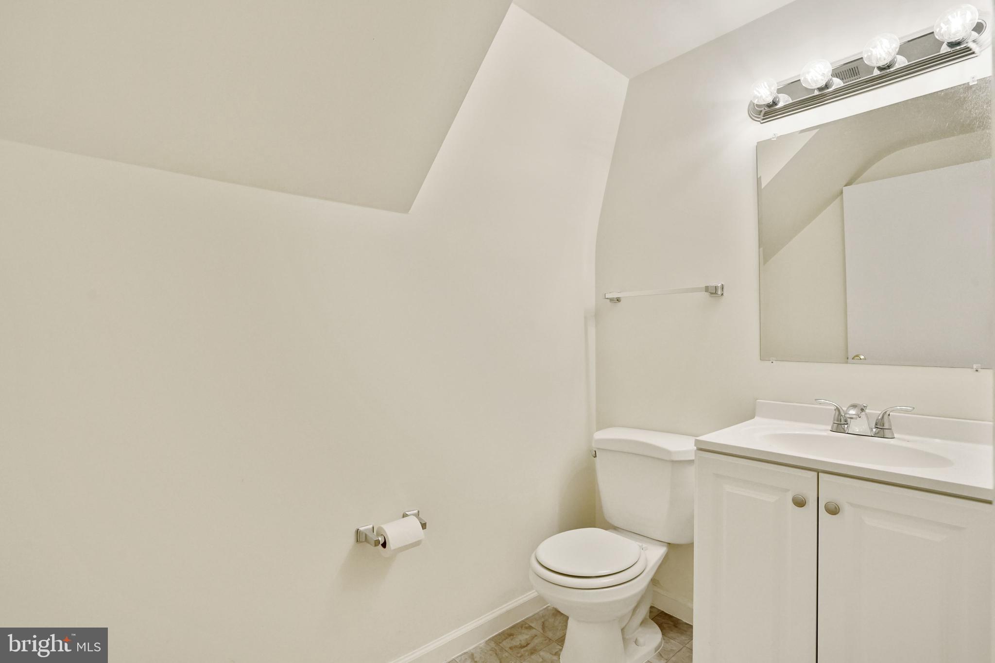 2911 Farm Road Alexandria, VA 22302 - Photo 30 of 35 a bathroom with a sink and a toilet