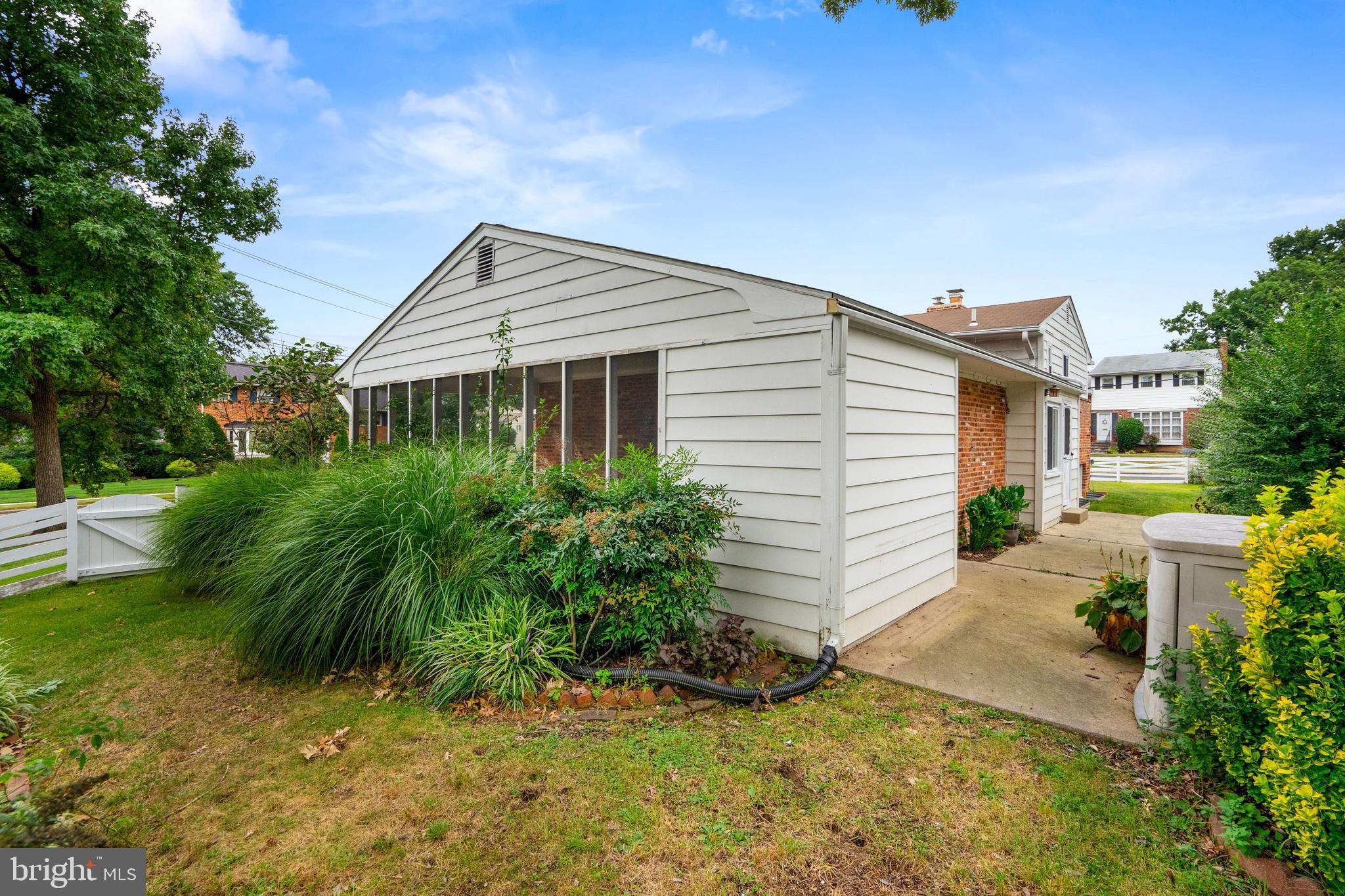 2911 Farm Road Alexandria, VA 22302 - Photo 32 of 35 a view of a house with a yard