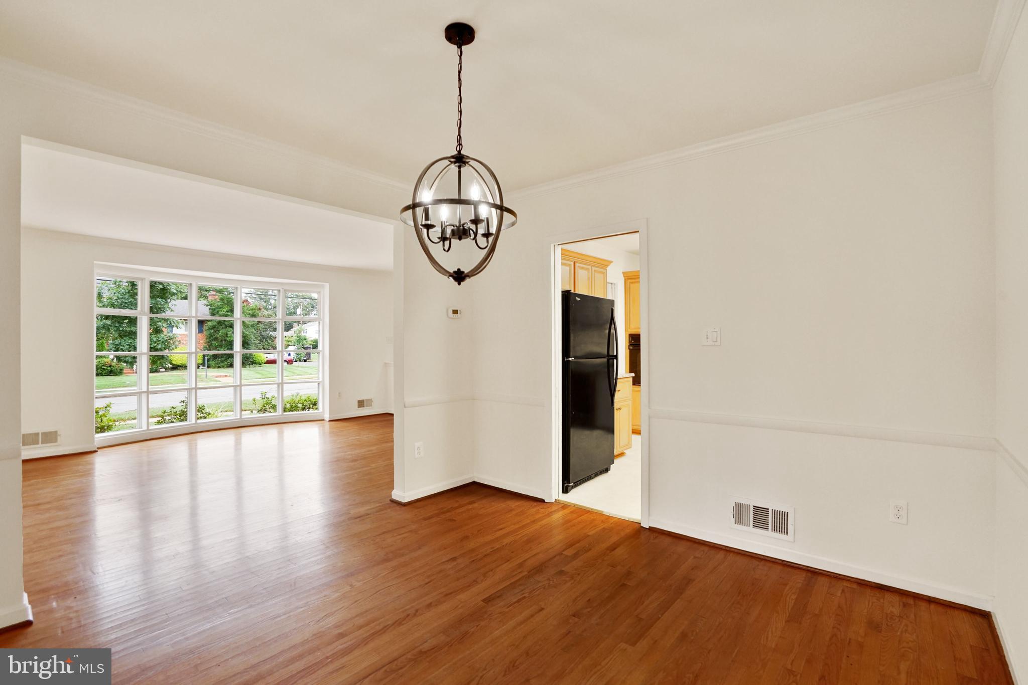 2911 Farm Road Alexandria, VA 22302 - Photo 5 of 35 a view of empty room with wooden floor and window