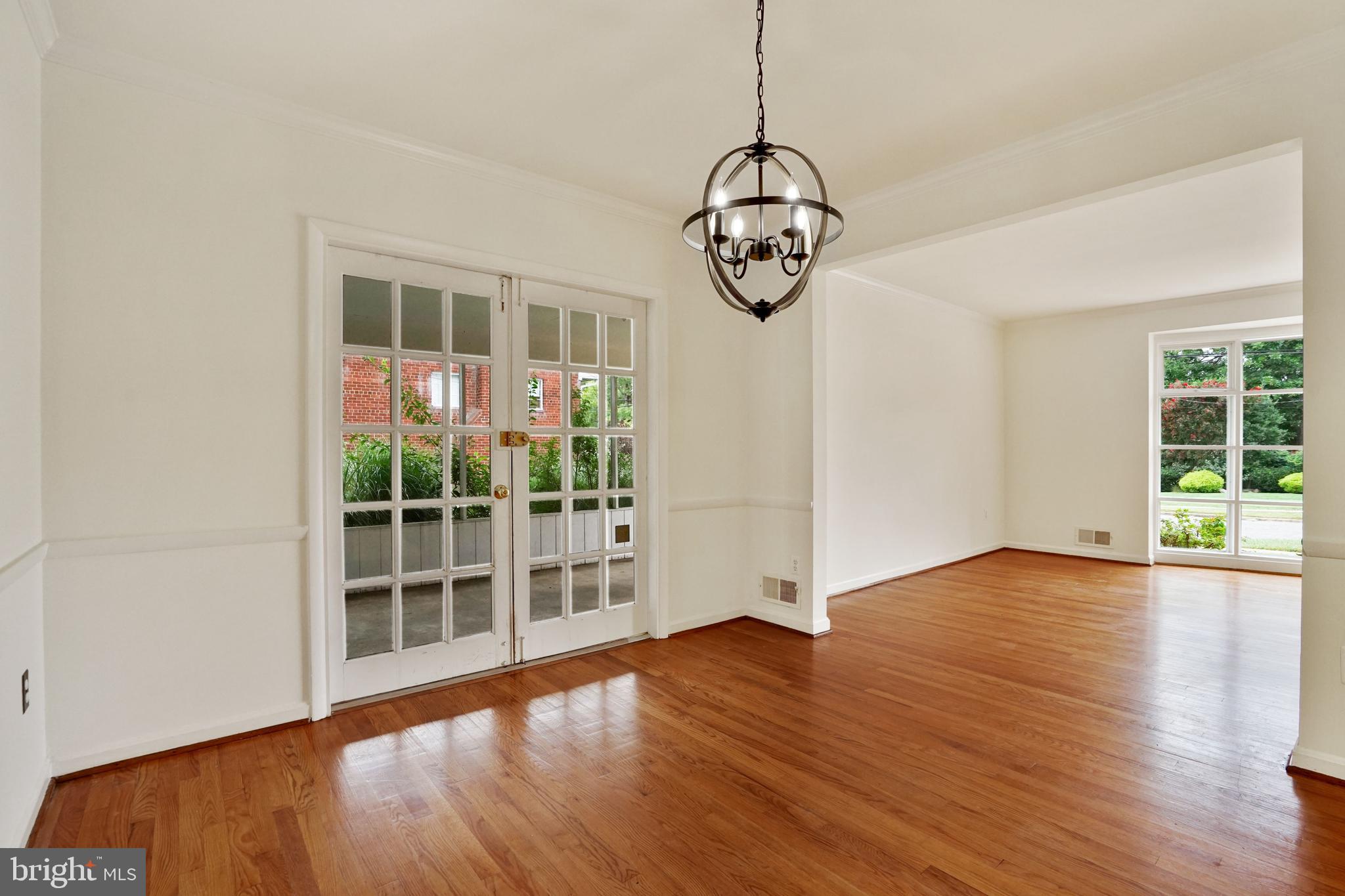 2911 Farm Road Alexandria, VA 22302 - Photo 6 of 35 a view of room with wooden floor and windows