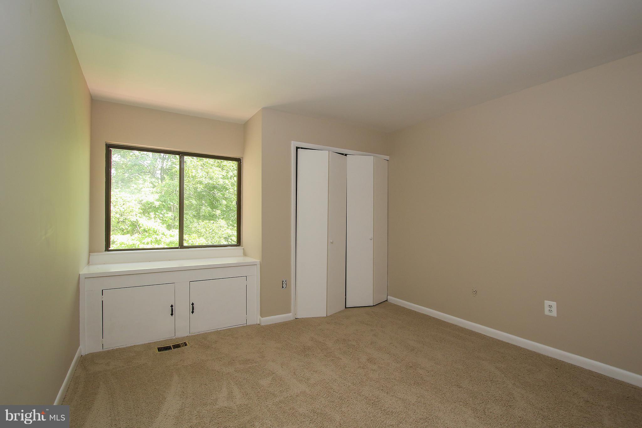 2033 Wethersfield Court Reston, VA 20191 - Photo 17 of 30 Bedroom With Window Seat and Storage
