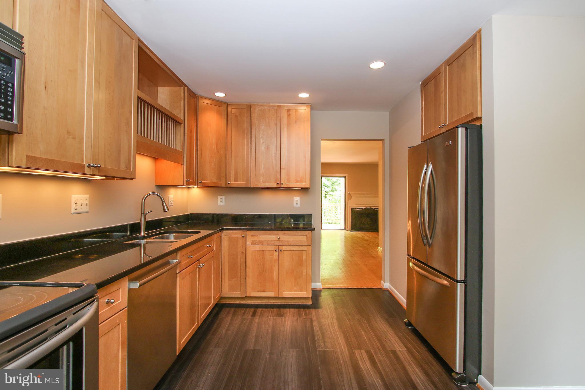 2033 Wethersfield Court Reston, VA 20191 - Photo 4 of 30 Kitchen Looking into Dining Room