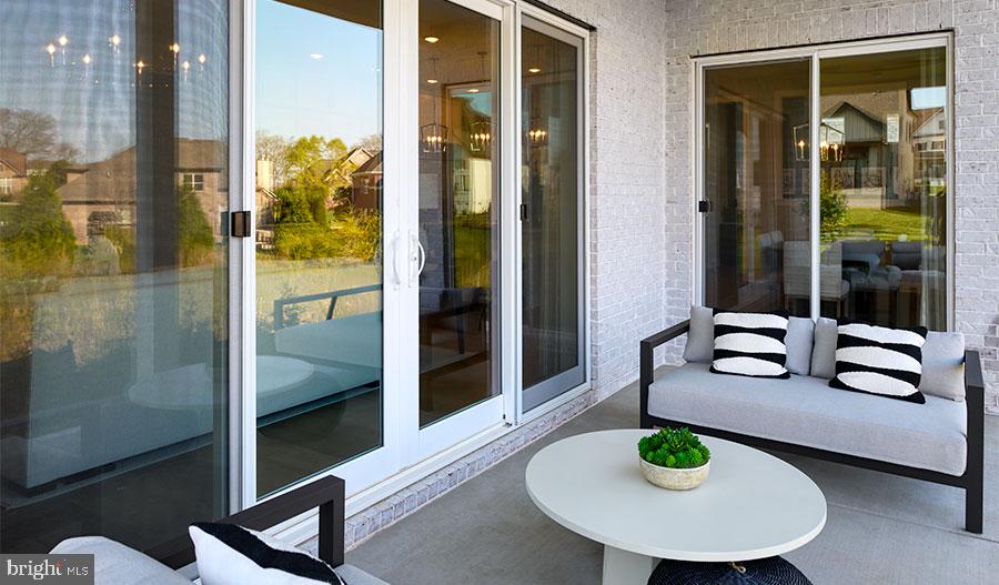2007 St James Road Accokeek, MD 20607 - Photo 14 of 20 a dining room with furniture and a wooden floor
