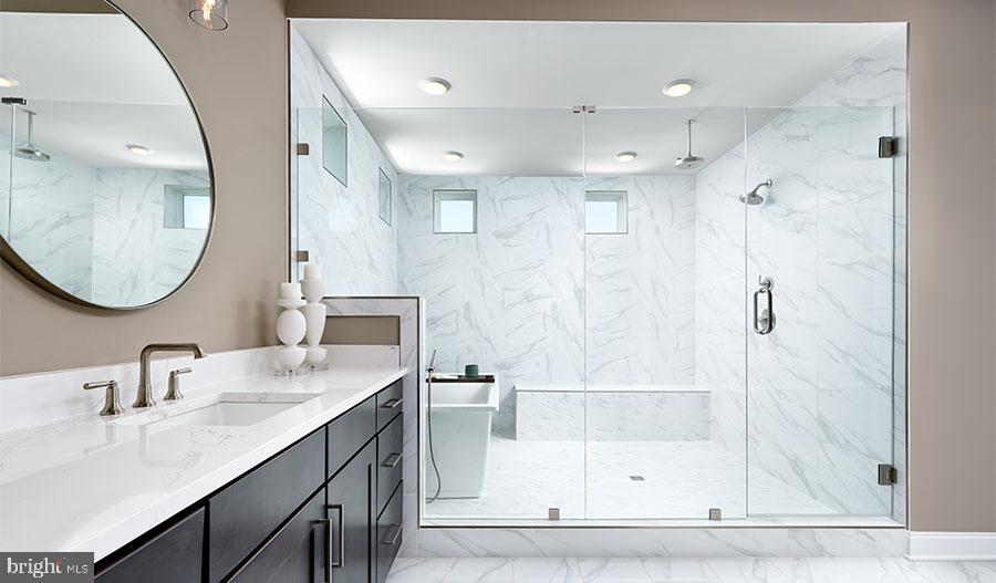 2007 St James Road Accokeek, MD 20607 - Photo 19 of 20 a bathroom with a granite countertop sink mirror and shower