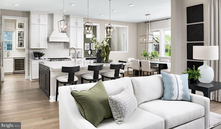 2007 St James Road Accokeek, MD 20607 - Photo 4 of 20 a living room with furniture a large window and a dining table