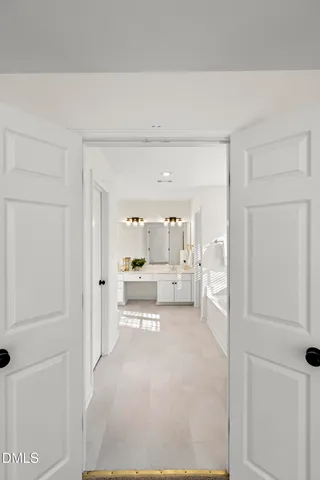 a view of living room filled with furniture and wooden floor