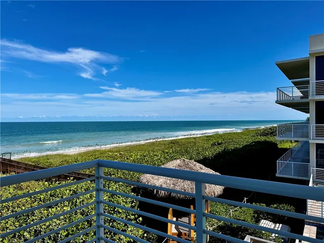 a view of a balcony with an outdoor space